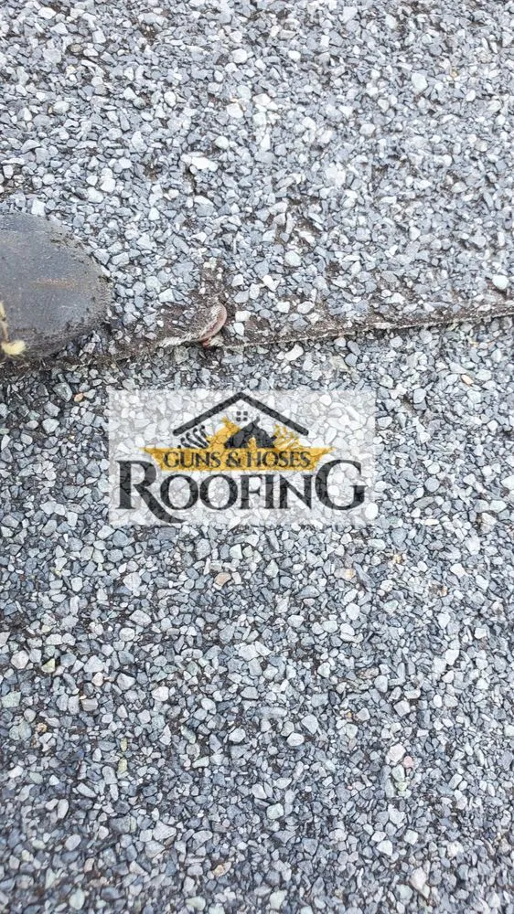 Slide of Guns & Hoses Roofing
