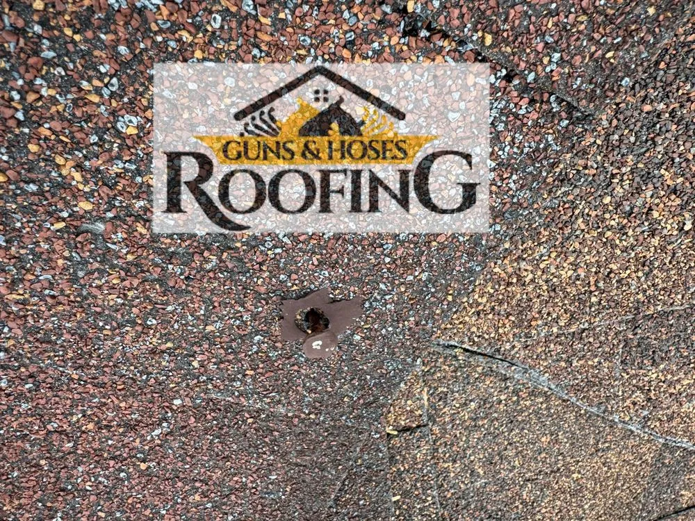 Slide of Guns & Hoses Roofing