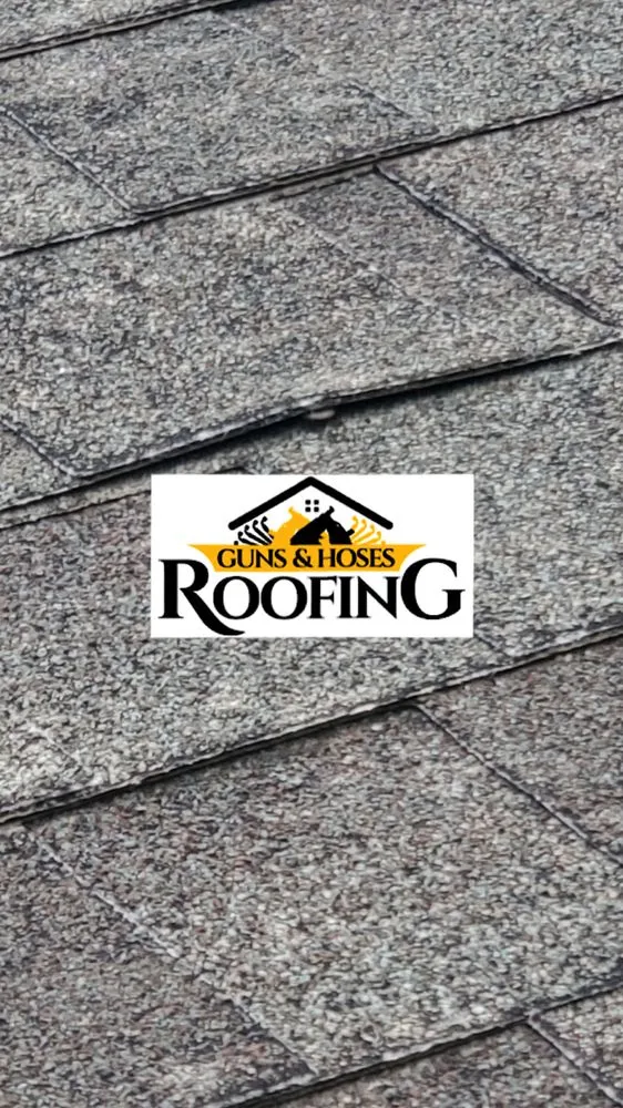 Slide of Guns & Hoses Roofing