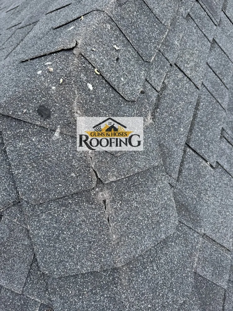 Slide of Guns & Hoses Roofing