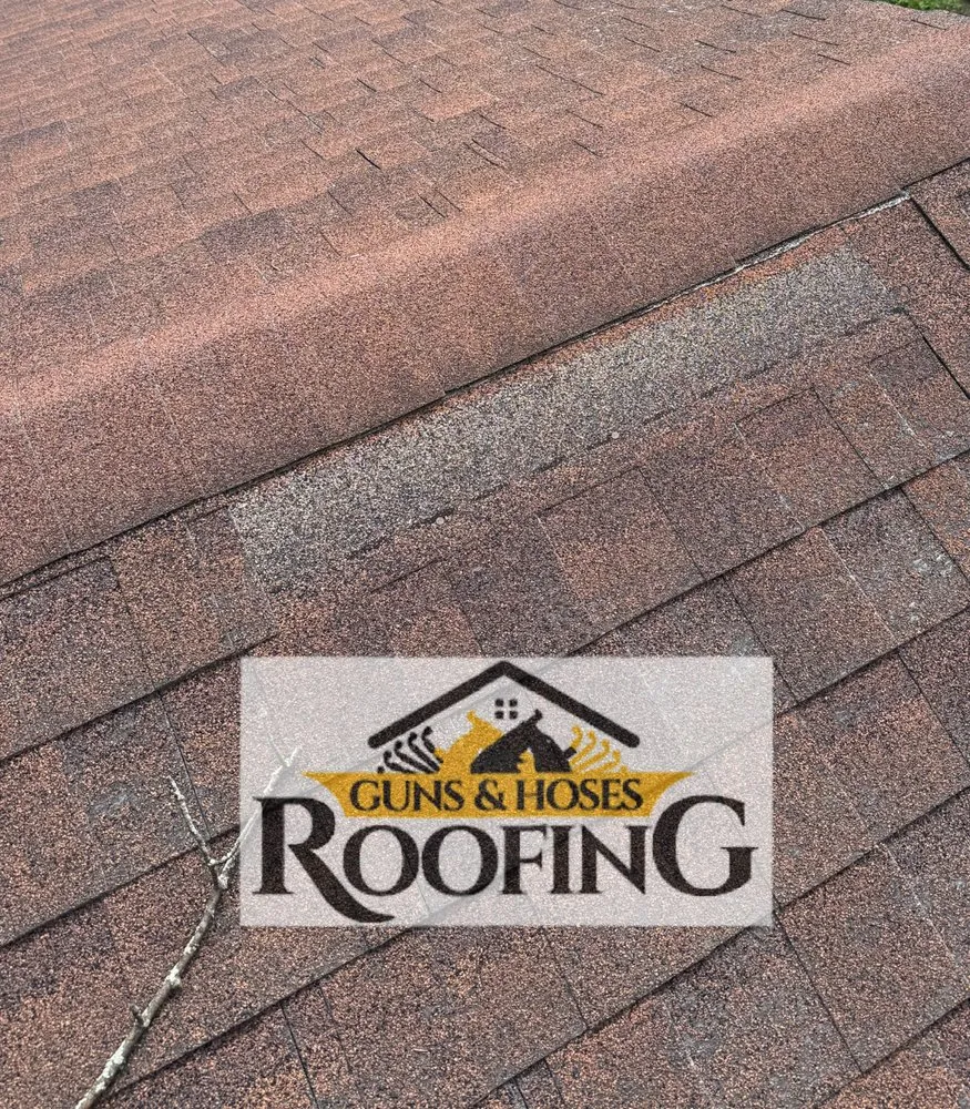 Slide of Guns & Hoses Roofing