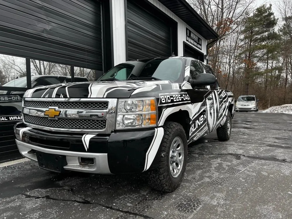 Slide of Guns N Hoses Roofing & Siding