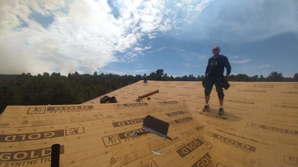 Slide of Gunsite Roofing