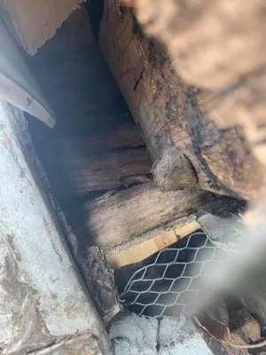 Gunslinger's Roofing Logo