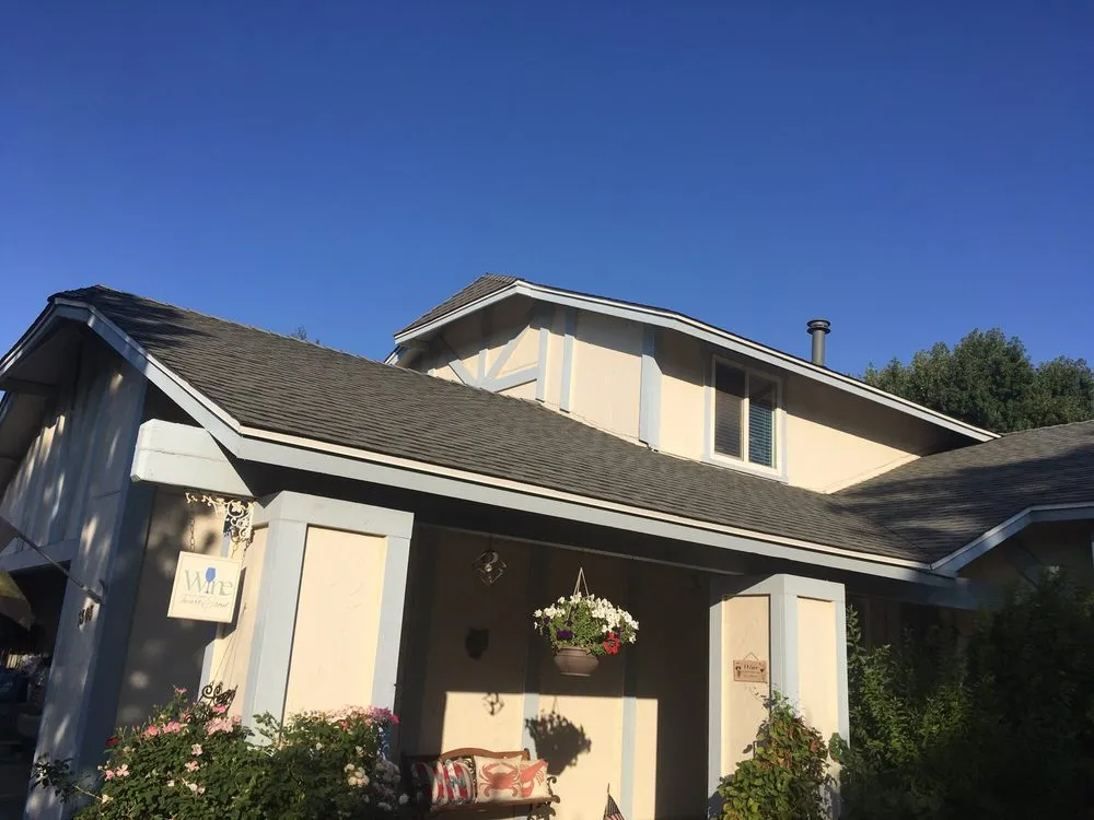 Slide of Gurrs Roofing