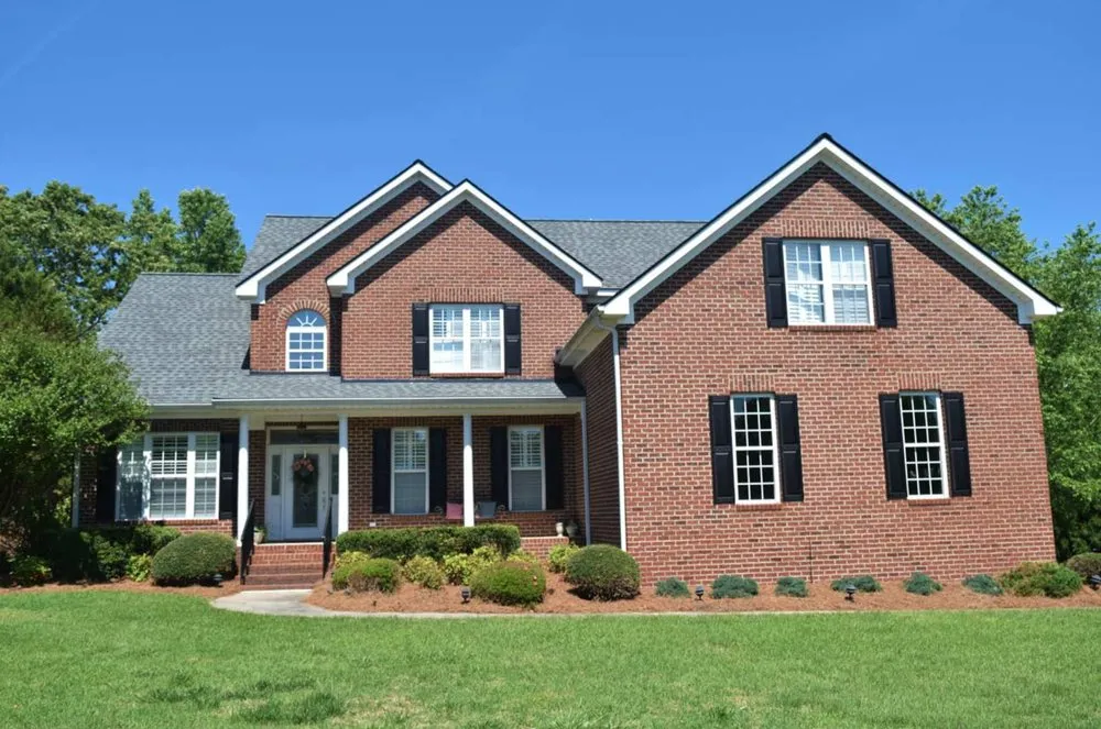 Slide of Guru Roofing Companies