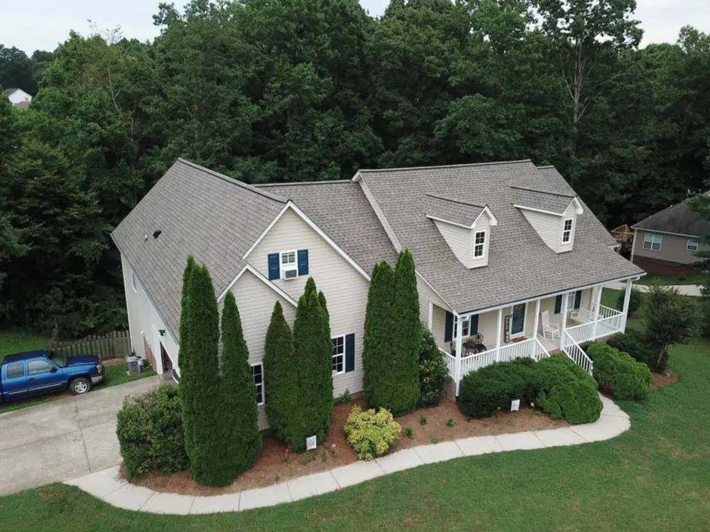 Slide of Guru Roofing Companies