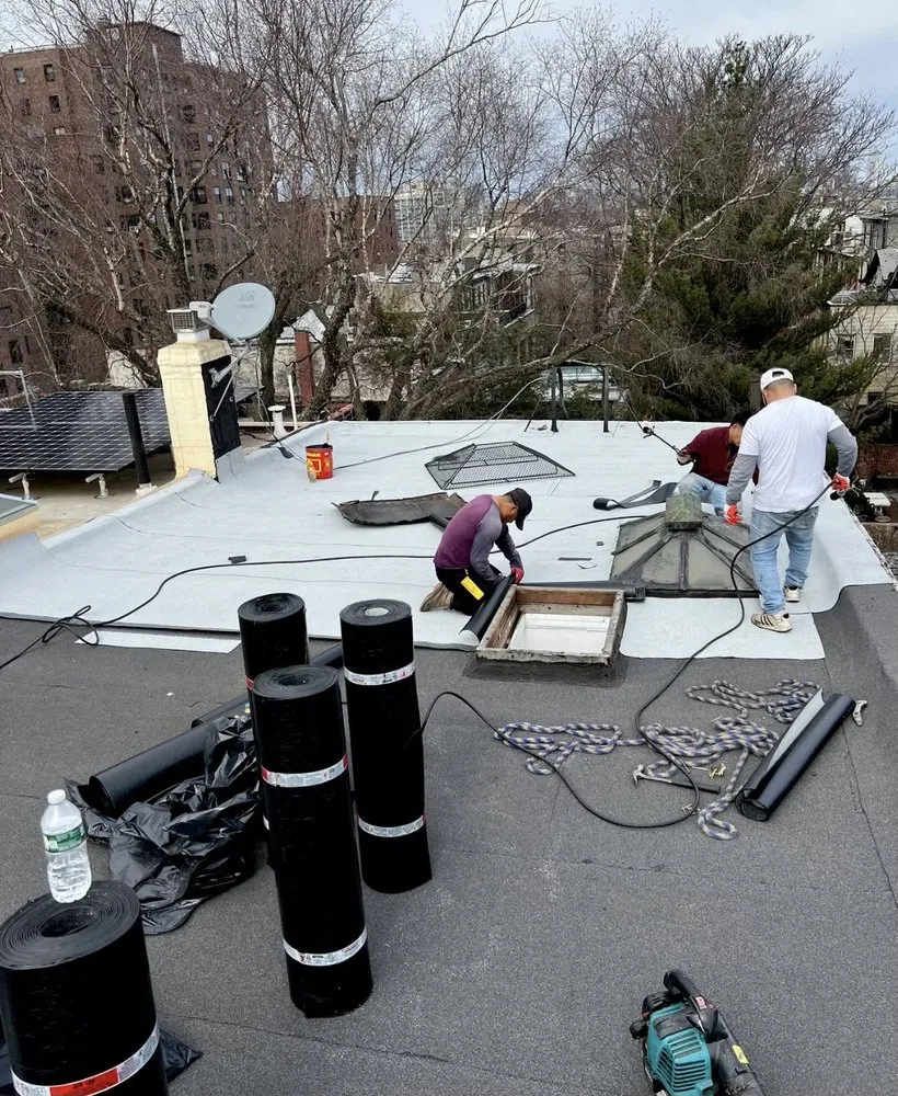 Slide of Gus And Sons Roofing