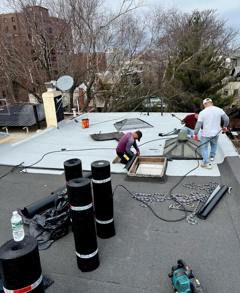 Slide of Gus And Sons Roofing