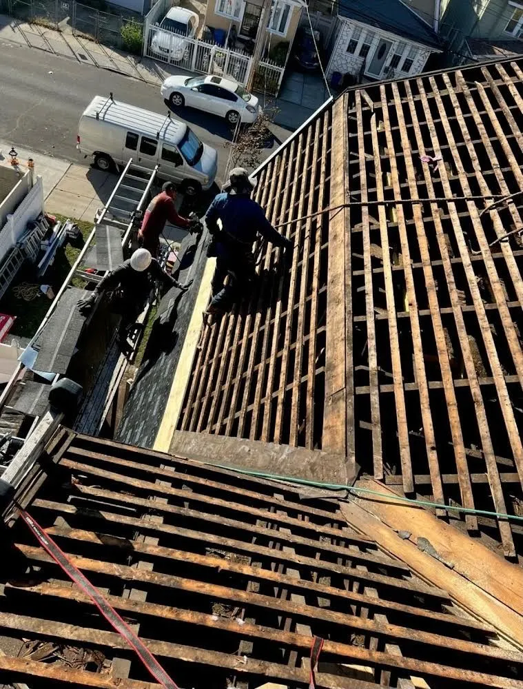 Slide of Gus And Sons Roofing