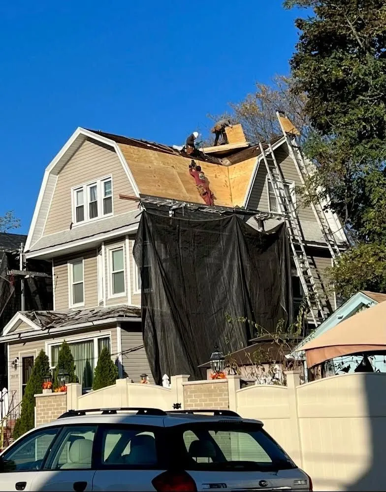 Slide of Gus And Sons Roofing