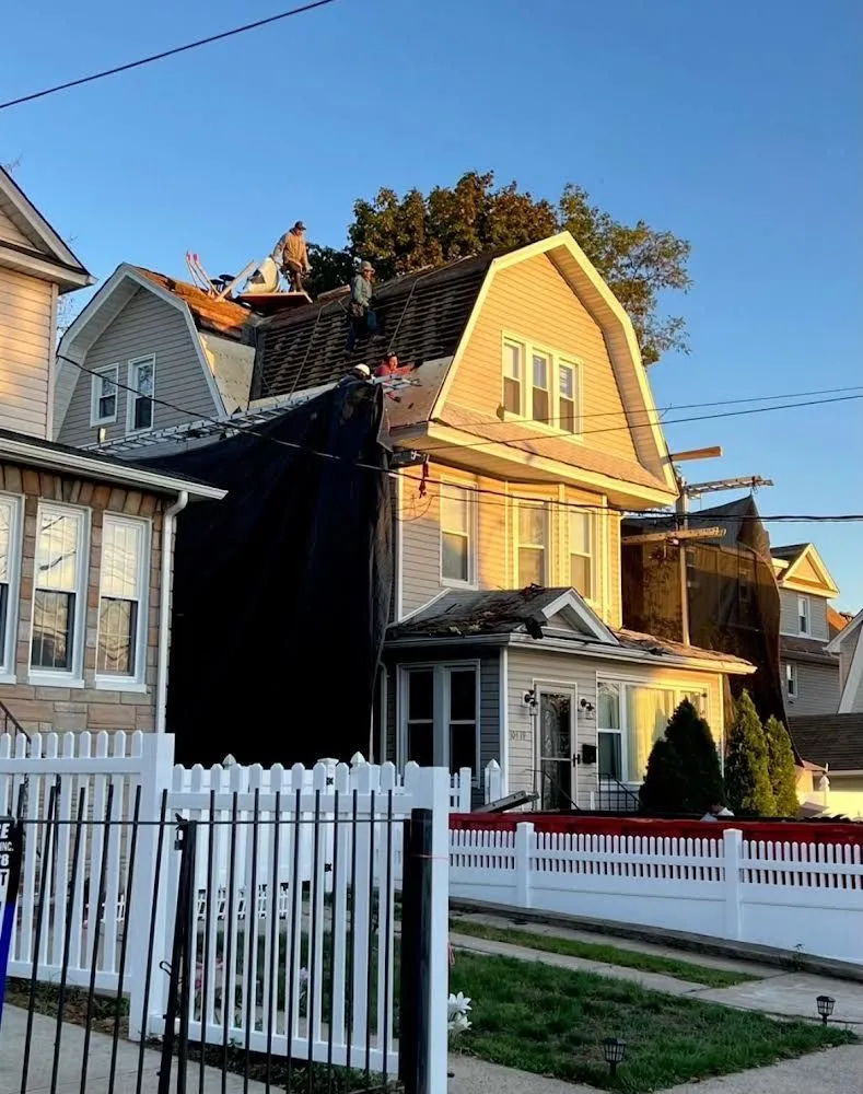 Slide of Gus And Sons Roofing