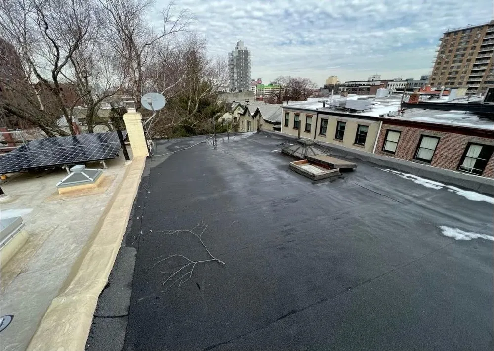 Slide of Gus And Sons Roofing