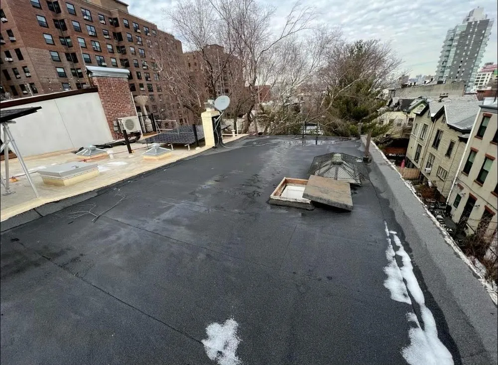 Slide of Gus And Sons Roofing