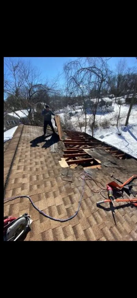 Slide of Gus And Sons Roofing