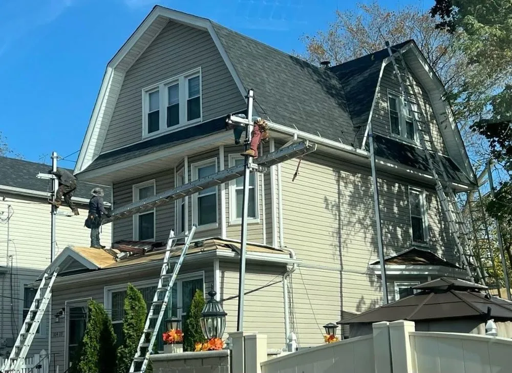 Slide of Gus And Sons Roofing