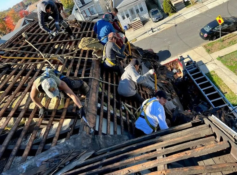 Slide of Gus And Sons Roofing