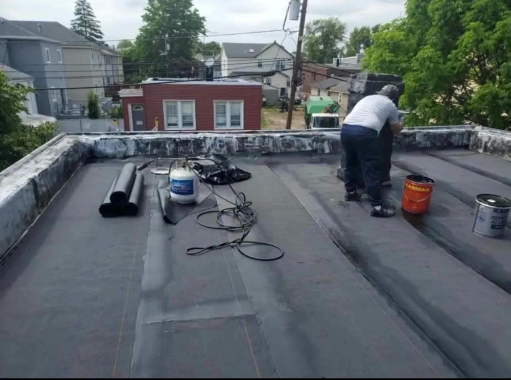 Slide of Gus And Sons Roofing