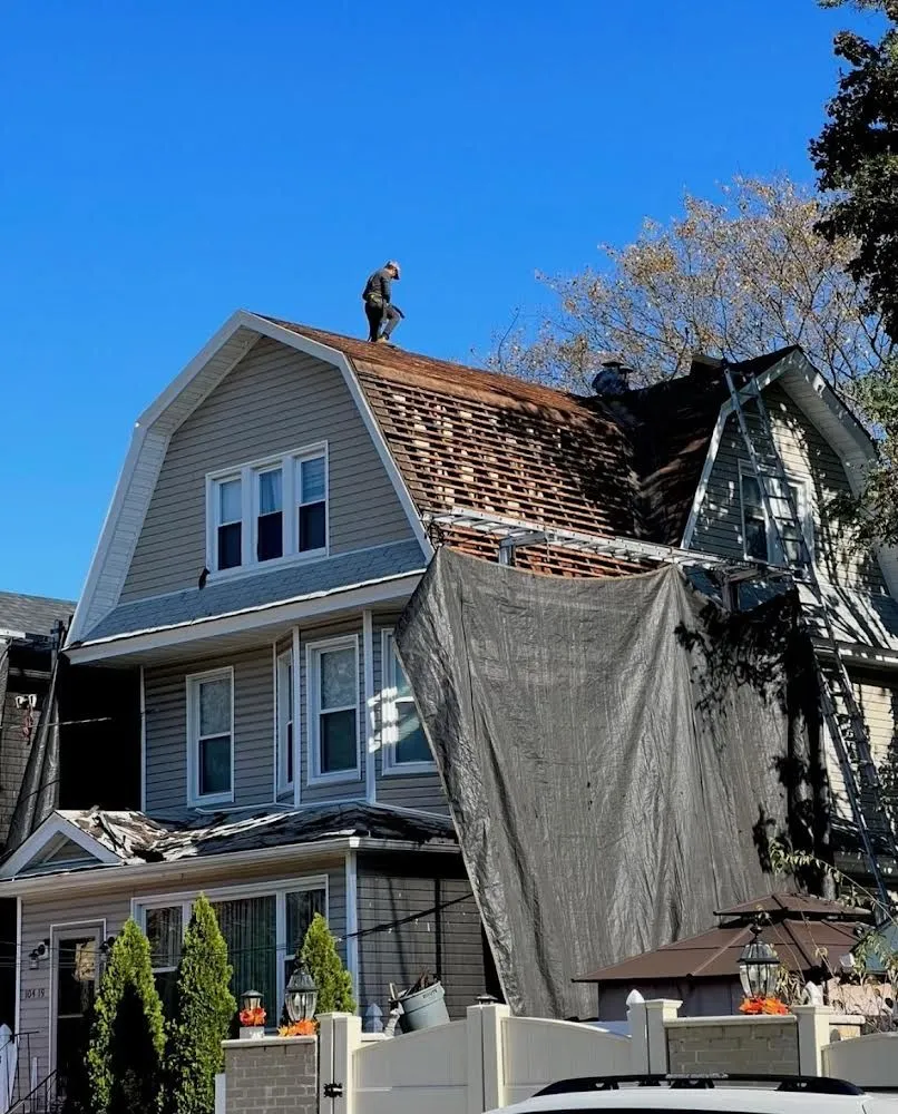 Slide of Gus And Sons Roofing