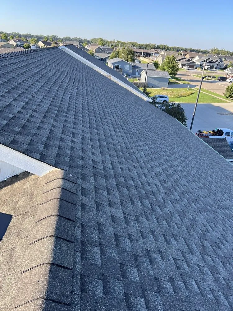 Slide of Gustafson Roofing