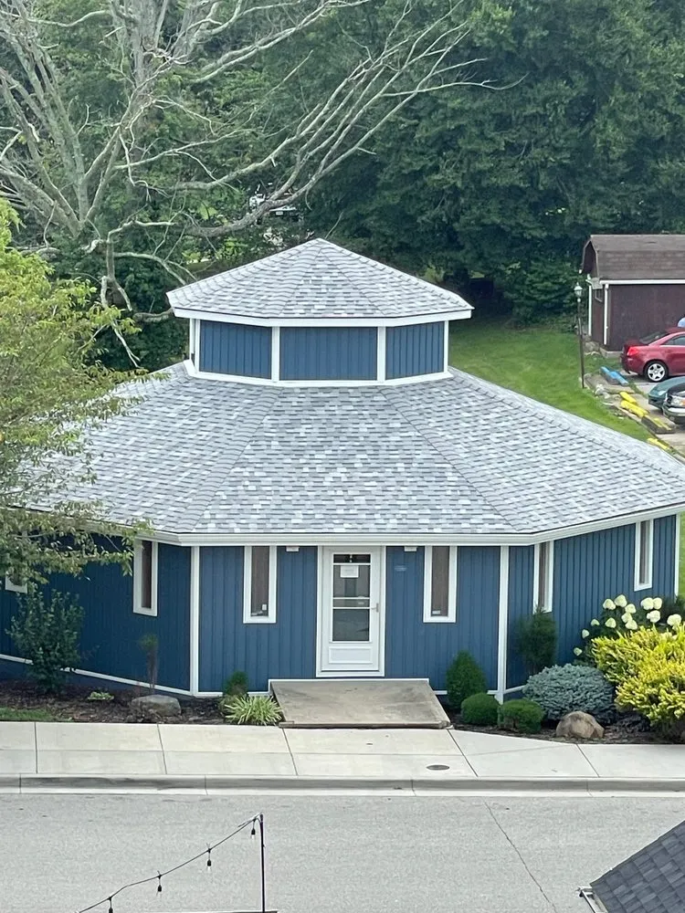 Slide of Gutapfel Roofing