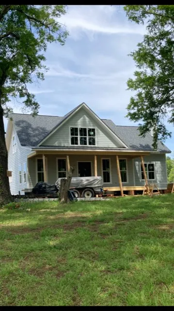 Slide of Gutter Guys Construction