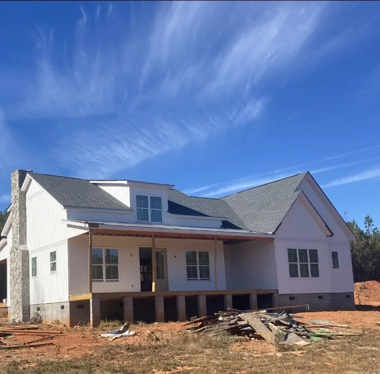 Slide of Gutter Guys Construction