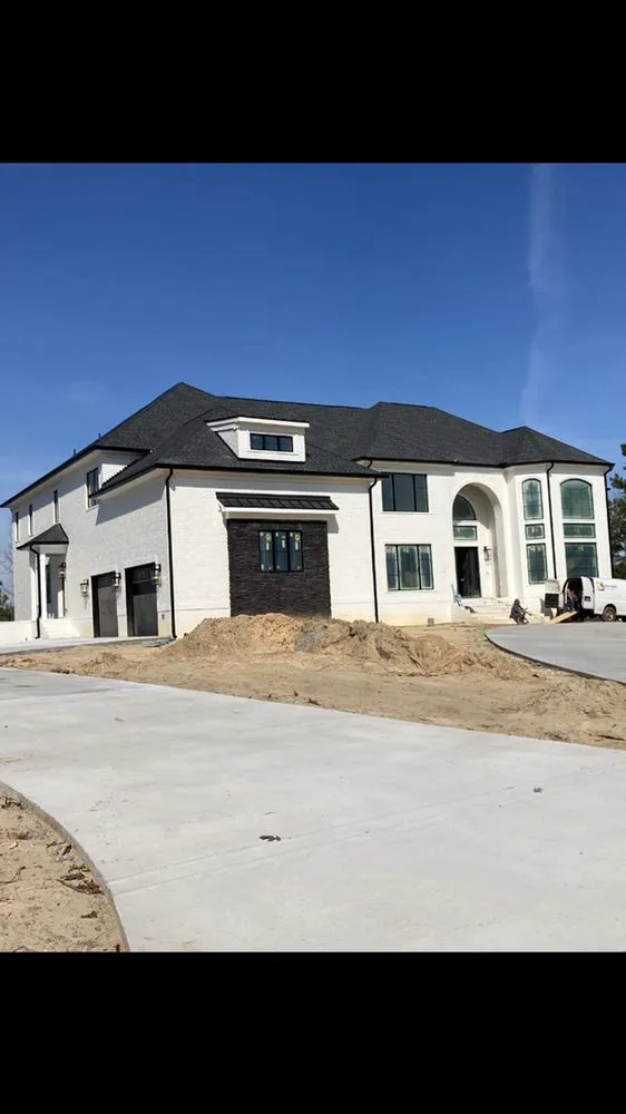 Slide of Gutter Guys Construction