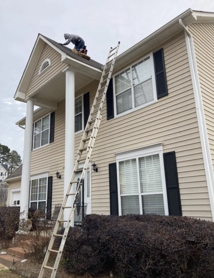 Slide of Gutter Guys Construction