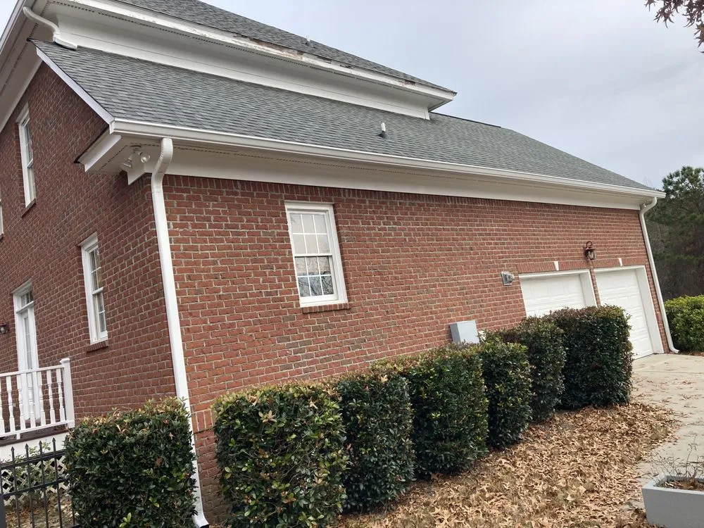 Slide of Gutter Guys Construction