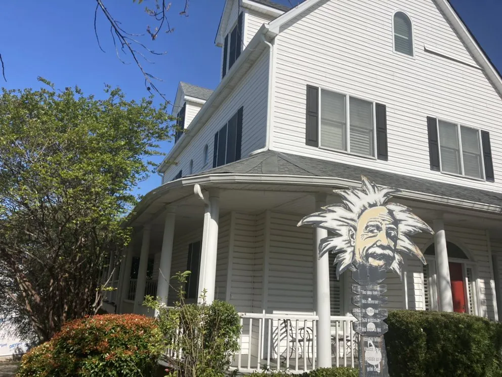 Slide of Gutter Guys Construction