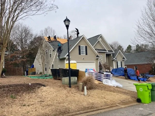 Slide of Gutter Guys Construction