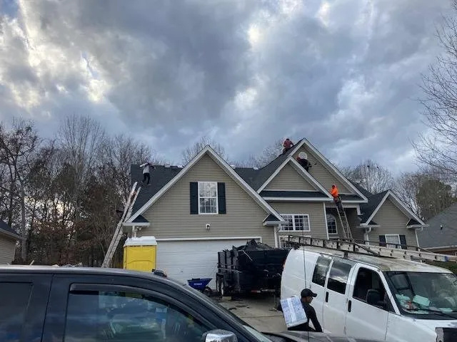 Slide of Gutter Guys Construction