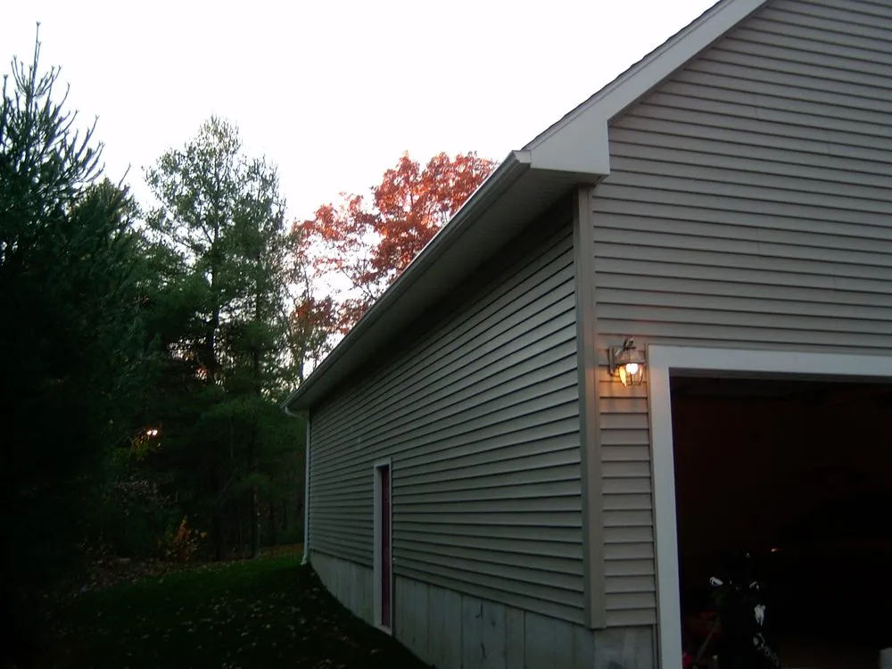 Slide of Gutter Helmet & Quality Roofing