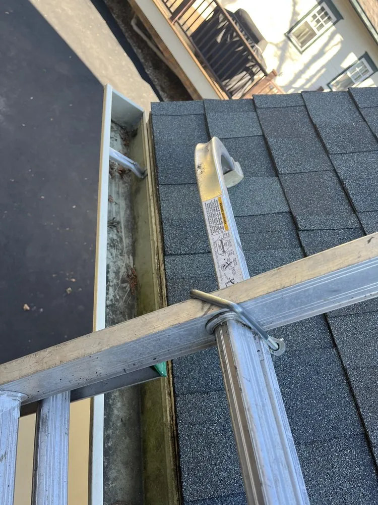 Slide of Gutter Pro and Home Repair