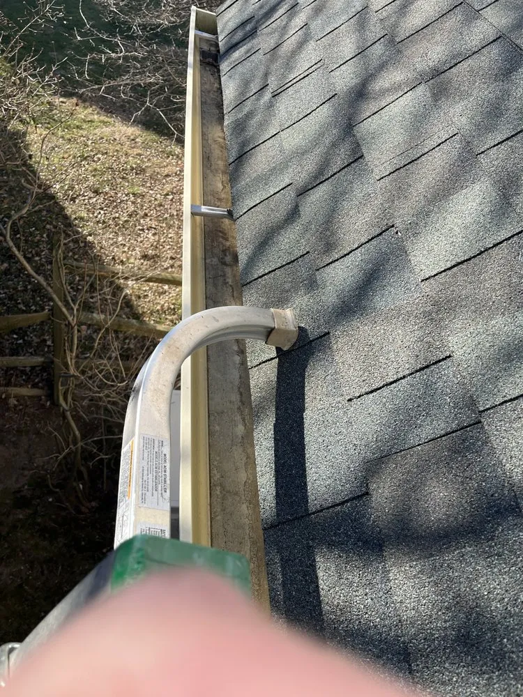 Slide of Gutter Pro and Home Repair