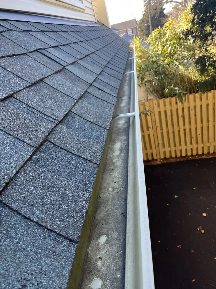 Slide of Gutter Pro and Home Repair