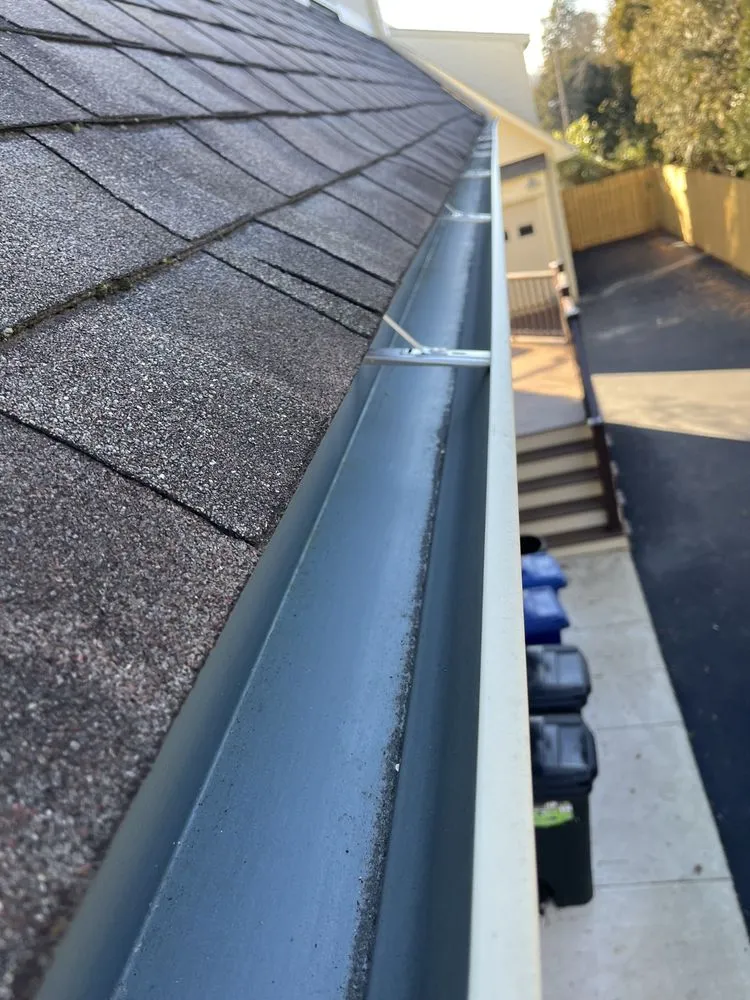 Slide of Gutter Pro and Home Repair