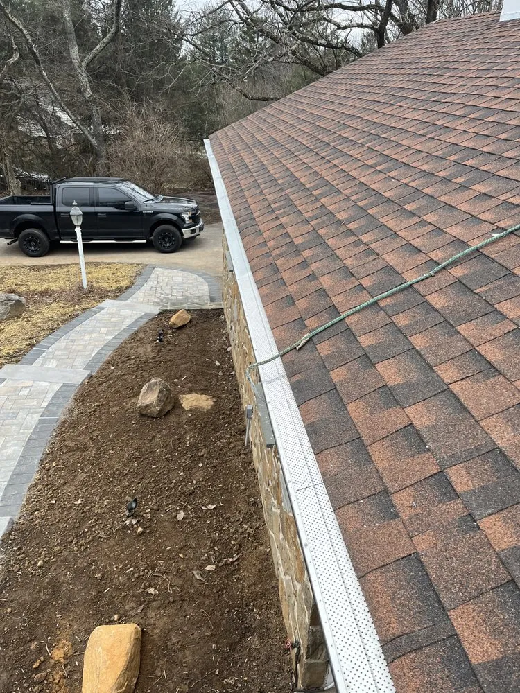 Slide of Gutter Pro and Home Repair