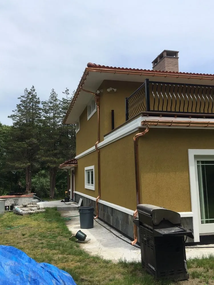 Slide of Gutter Service of New England