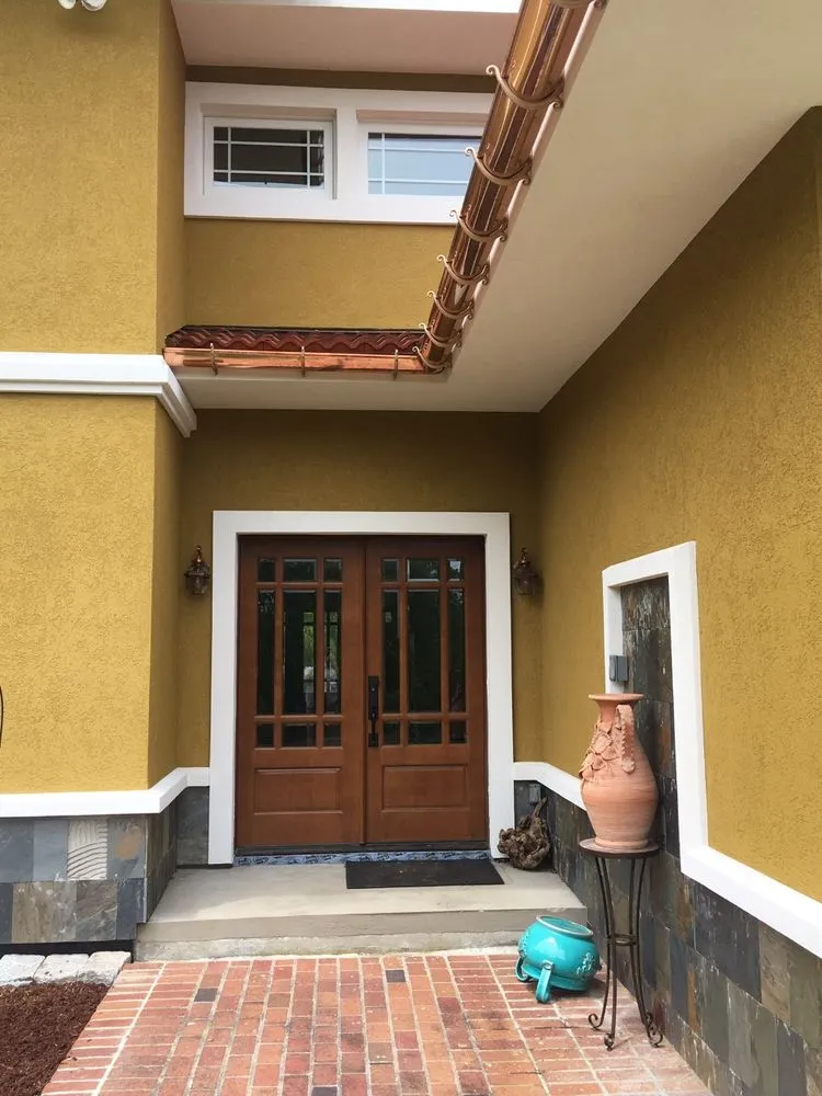 Slide of Gutter Service of New England