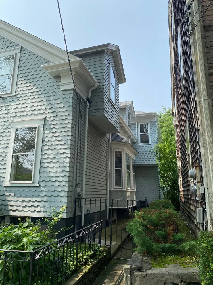 Slide of Gutter Service of New England