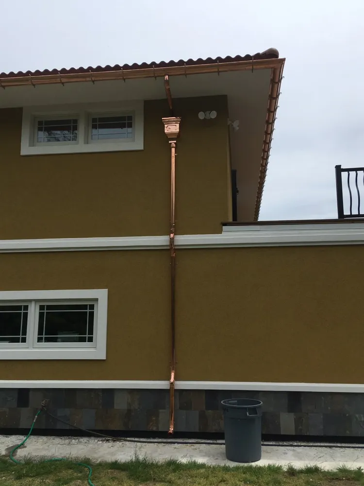 Slide of Gutter Service of New England