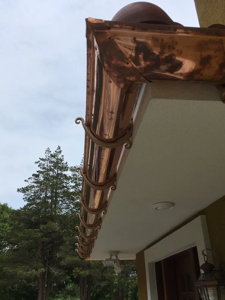 Slide of Gutter Service of New England