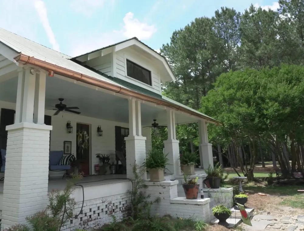 Slide of GutterGuys Premium Exterior Products