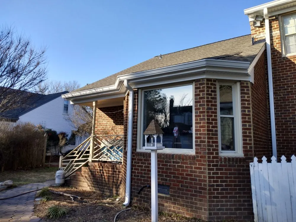 Slide of Gutters & Roof Installation