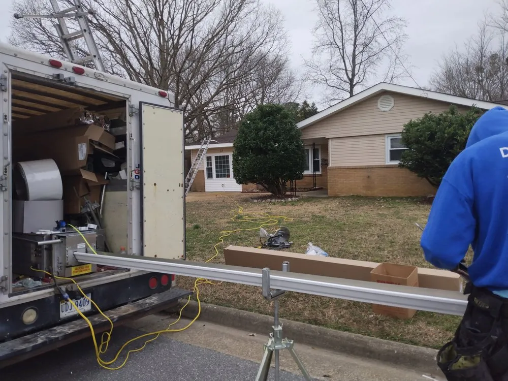 Slide of Gutters & Roof Installation