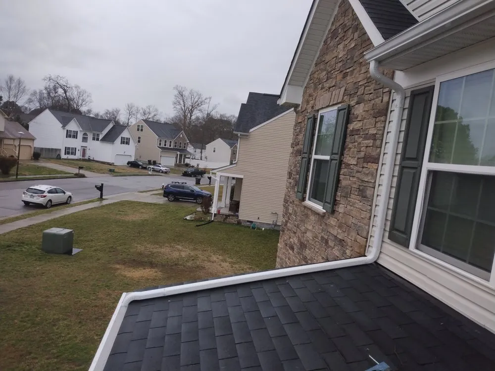 Slide of Gutters & Roof Installation