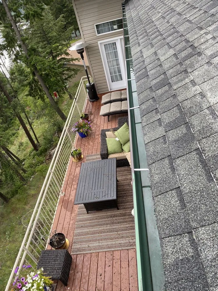 Professional flat roof repair experts serving Spokane County, WA - Gutters Be Clean