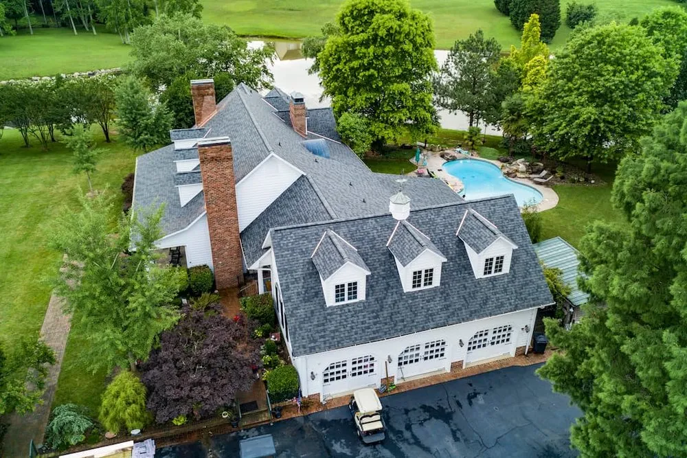 Slide of Guy Roofing